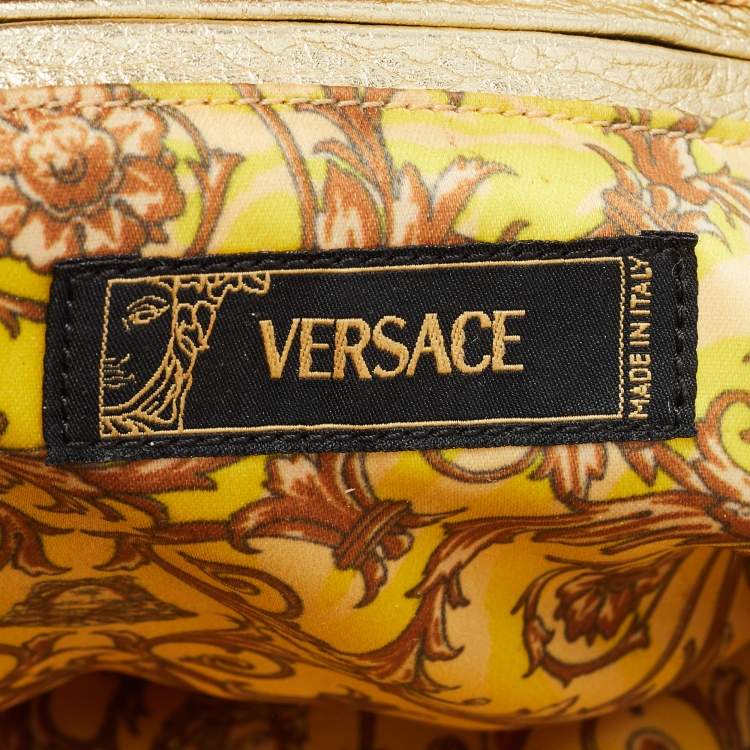 Pre Owned Versace White/Gold Fabric And Leather Zip Embellished Repeat Hobo