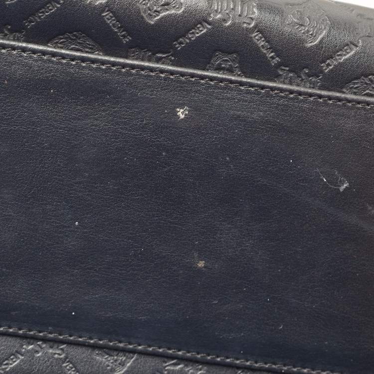 Pre Owned Versace Black Embossed Leather Front Pocket Baguette Bag