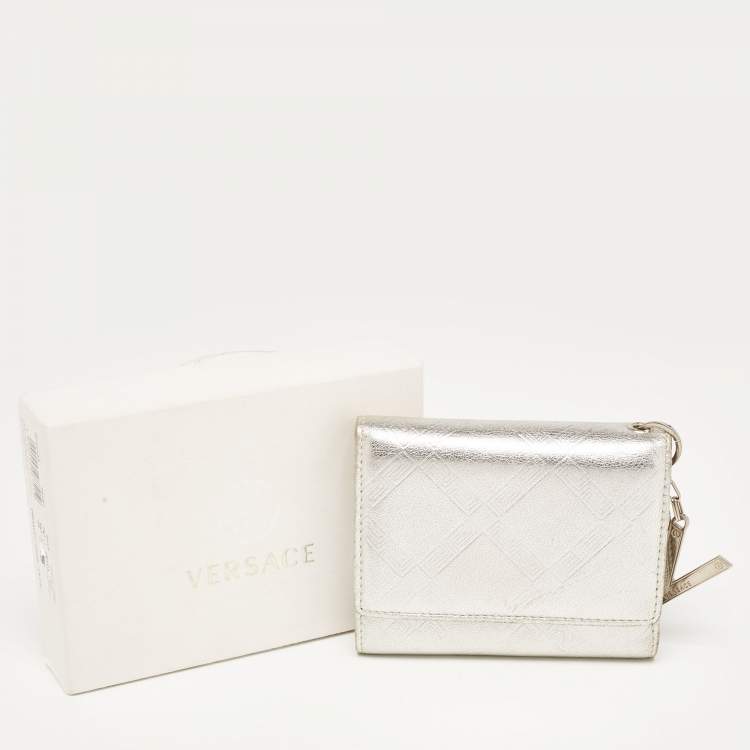 Pre Owned Versace Silver Embossed Leather V Charm Trifold Wallet