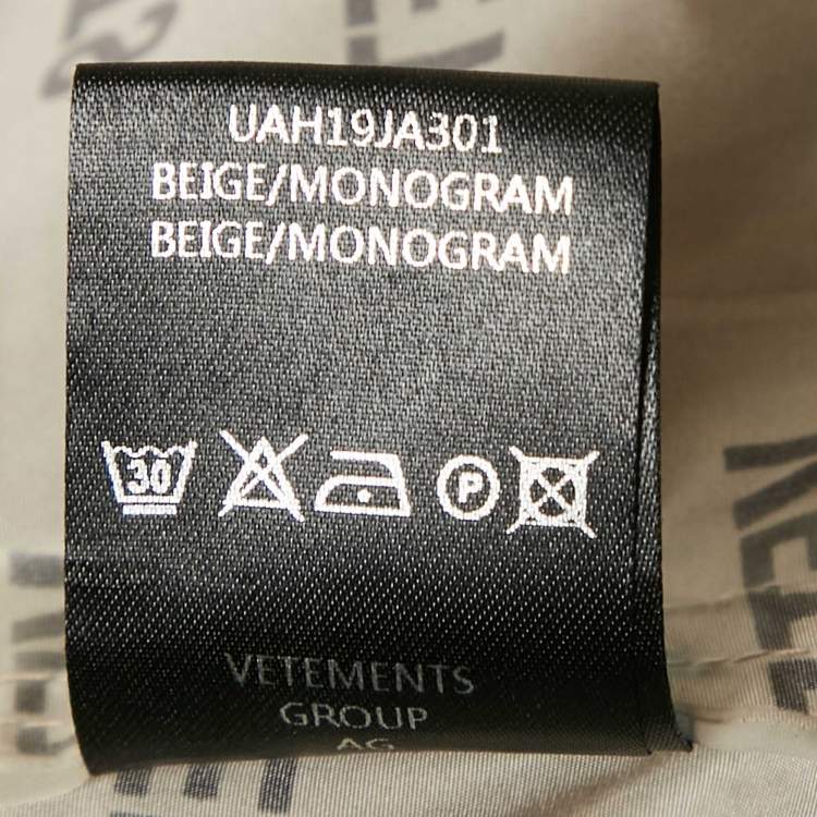Pre Owned Vetements Beige Logo Print Shell Raincoat One Size 