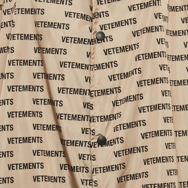 Pre Owned Vetements Beige Logo Print Shell Raincoat One Size 
