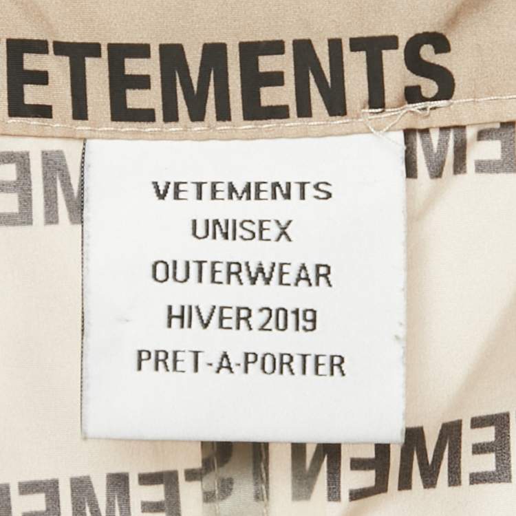 Pre Owned Vetements Beige Logo Print Shell Raincoat One Size 