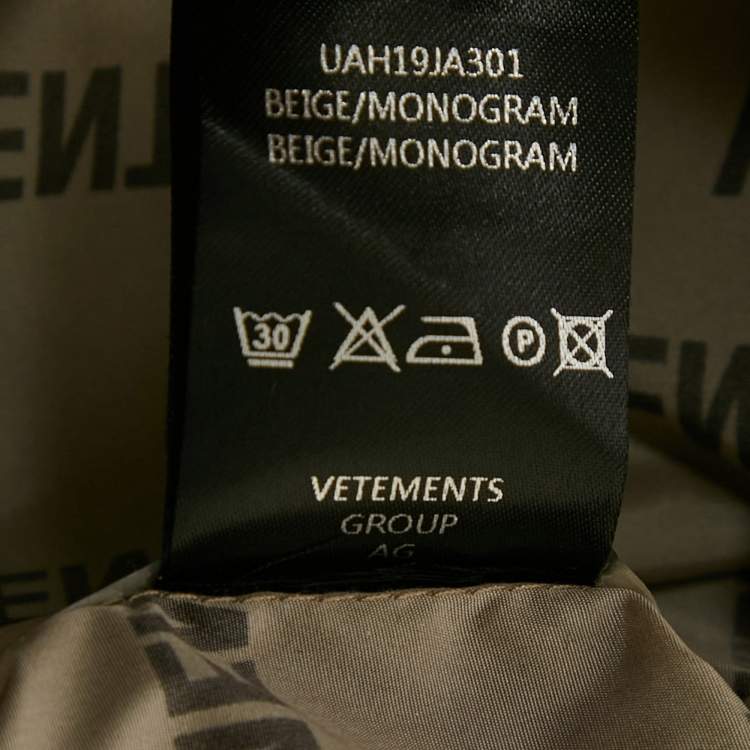 Pre Owned Vetements Beige Logo Print Nylon Shell Raincoat XS