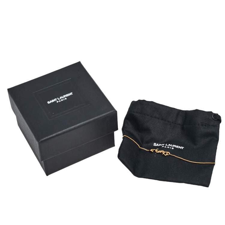 Pre Owned Yves Saint Laurent Paris Gold Tone Monogram Charm Bracelet