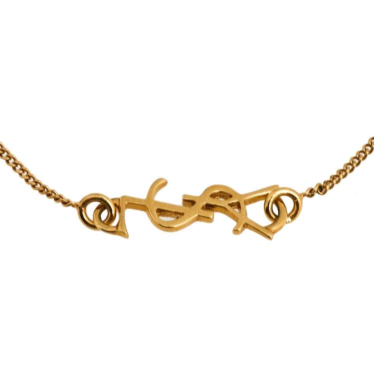 Pre Owned Yves Saint Laurent Paris Gold Tone Monogram Charm Bracelet