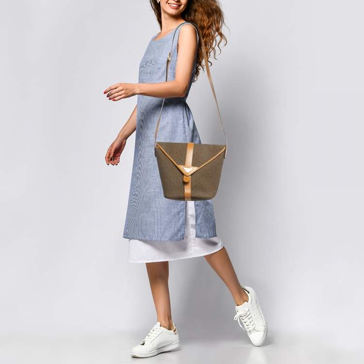 Pre Owned Yves Saint Laurent Brown Printed Woven Fabric and Leather Flap Bucket Bag