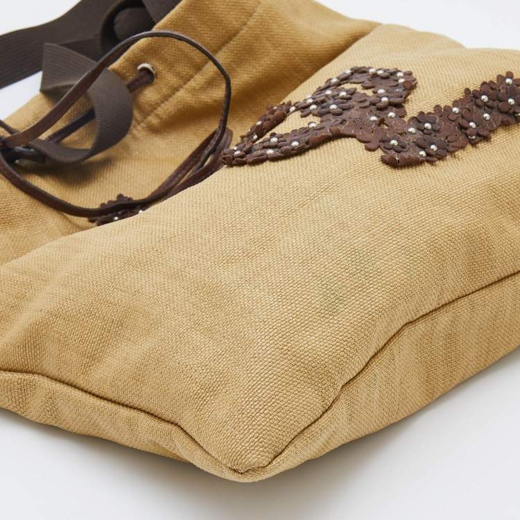 Pre Owned Yves Saint Laurent Beige/Brown Straw and Leather Drawstring Tote