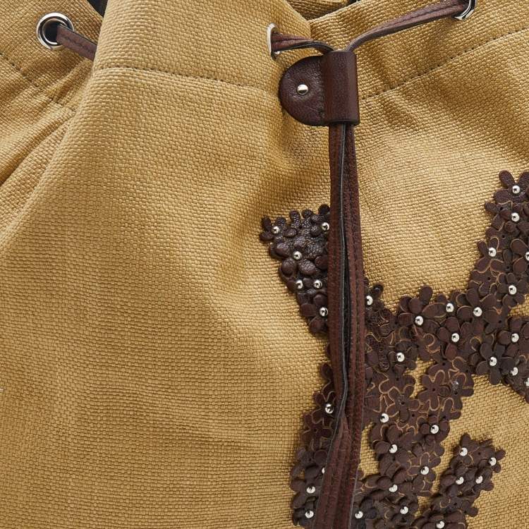 Pre Owned Yves Saint Laurent Beige/Brown Straw and Leather Drawstring Tote