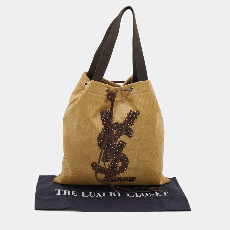 Pre Owned Yves Saint Laurent Beige/Brown Straw and Leather Drawstring Tote