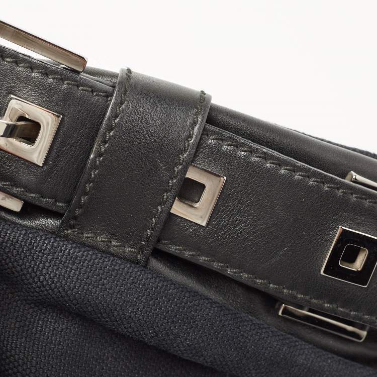 Pre Owned Yves Saint Laurent Black Canvas and Leather Buckle Flap Baguette Bag