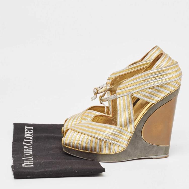 Pre Owned Yves Saint Laurent Gold/Silver Leather and Suede Peep Toe Wedge Pumps 37.5
