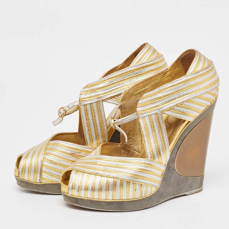Pre Owned Yves Saint Laurent Gold/Silver Leather and Suede Peep Toe Wedge Pumps 37.5
