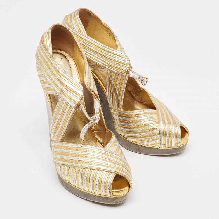 Pre Owned Yves Saint Laurent Gold/Silver Leather and Suede Peep Toe Wedge Pumps 37.5