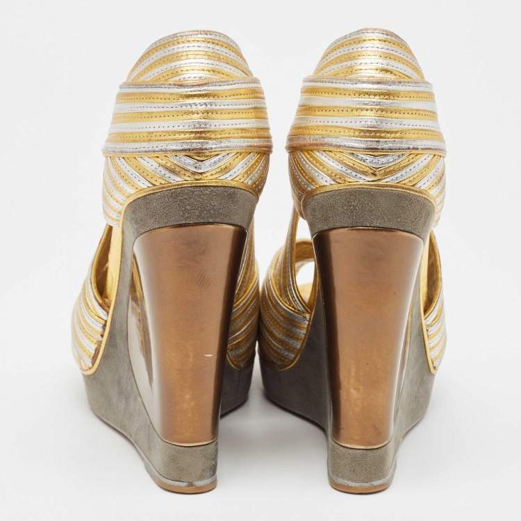 Pre Owned Yves Saint Laurent Gold/Silver Leather and Suede Peep Toe Wedge Pumps 37.5