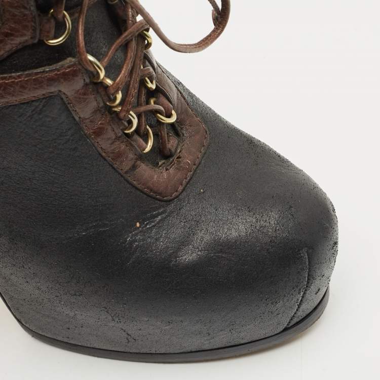 Pre Owned Yves Saint Laurent Black/Brown Shearling Fur and Suede Tribtoo Ankle Length Boots Size 38.5