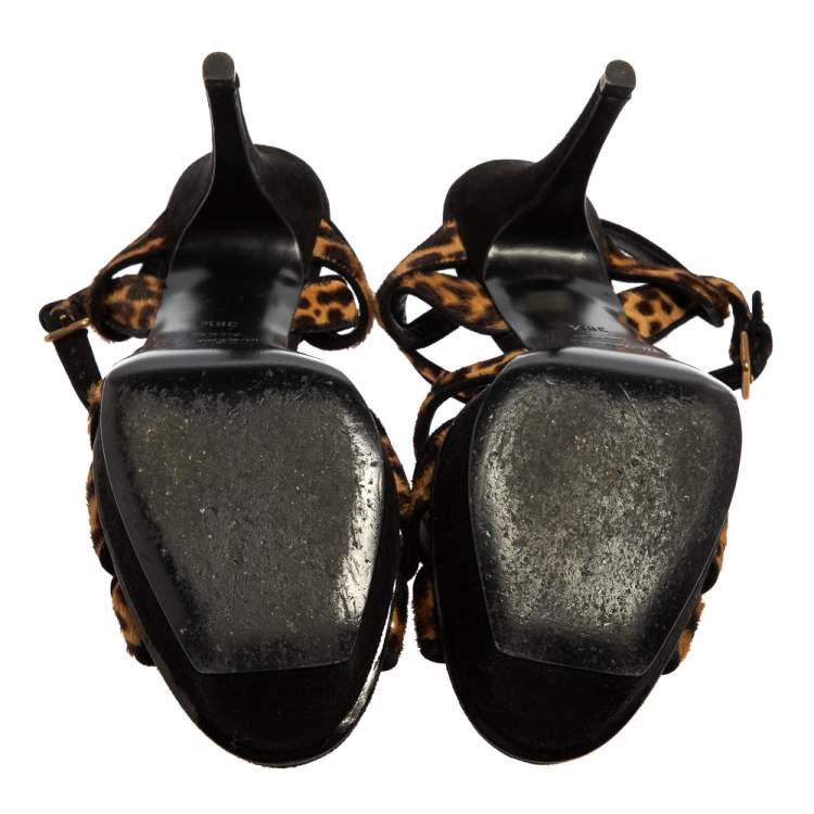 مملوكة مسبقًا Yves Saint Laurent Beige/Brown Leopard Print Calf Hair And Suede Tribute Platform Ankle Strap Sandals Size 38.5