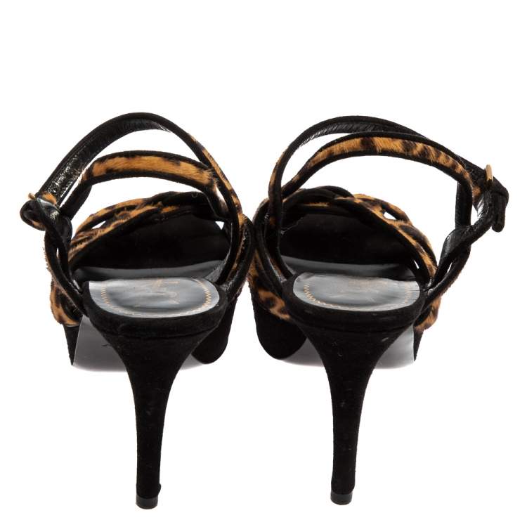 مملوكة مسبقًا Yves Saint Laurent Beige/Brown Leopard Print Calf Hair And Suede Tribute Platform Ankle Strap Sandals Size 38.5