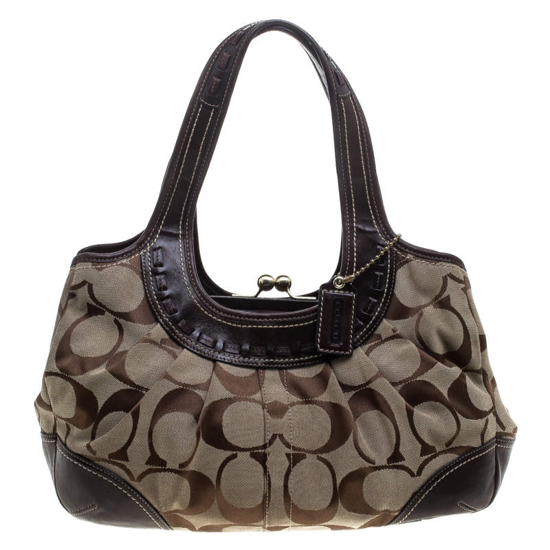 Pre Owned Coach Beige/Brown Signature Canvas and Leather Kiss Lock Shoulder Bag 