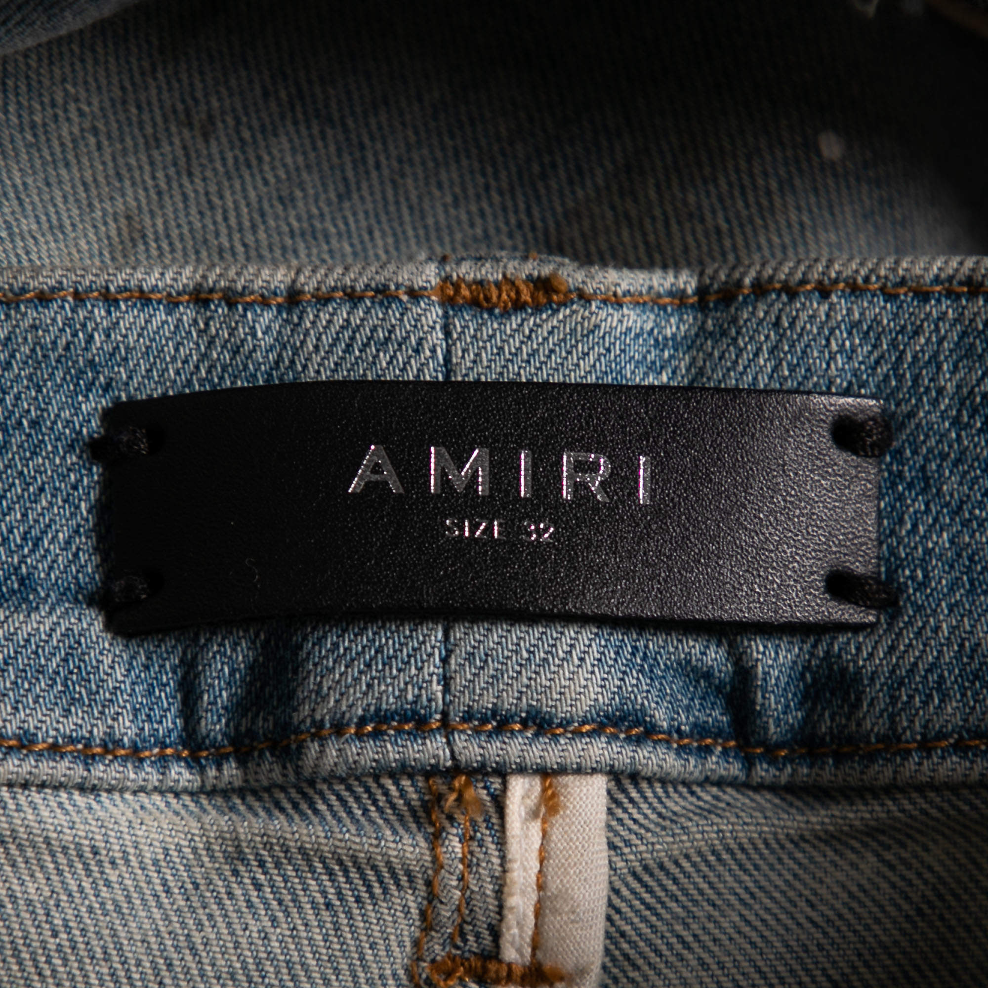 Amiri Blue Distressed Denim Patch Applique Detailed Slim Fit Jeans