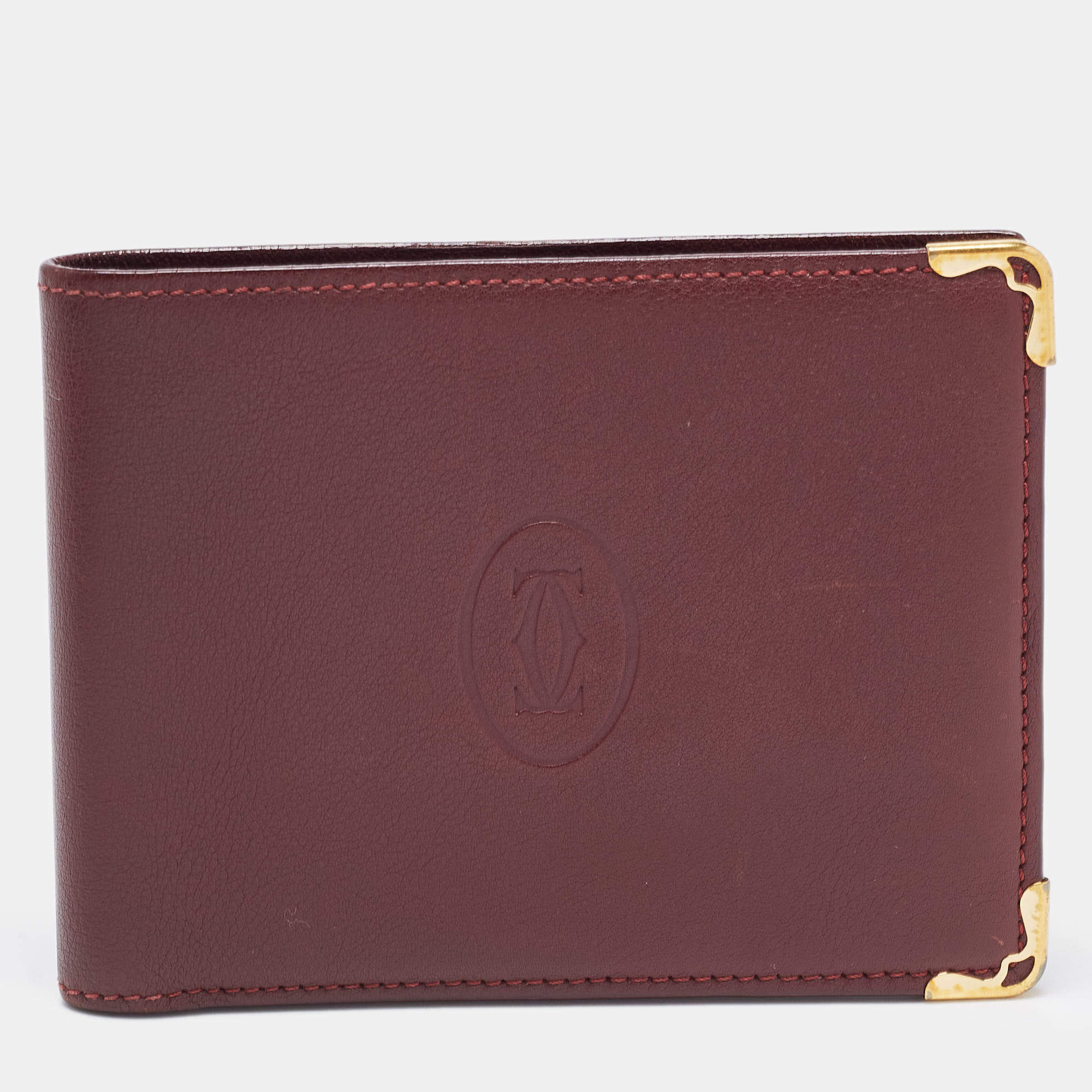 Pre Owned Cartier Burgundy Leather Must De Cartier 6CC Bifold Wallet