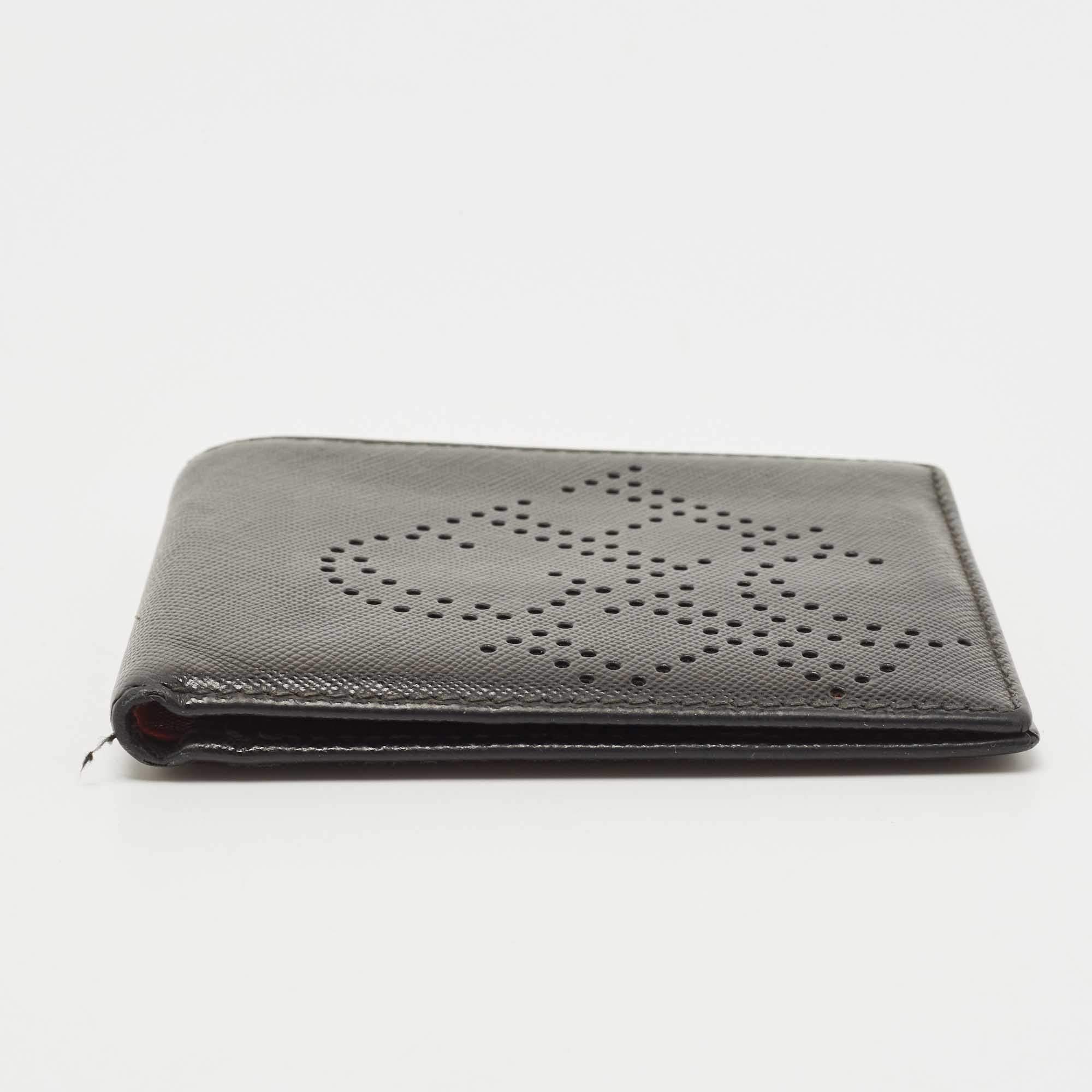Pre Owned CH Carolina Herrera Black Leather Perforated Logo Bifold Wallet