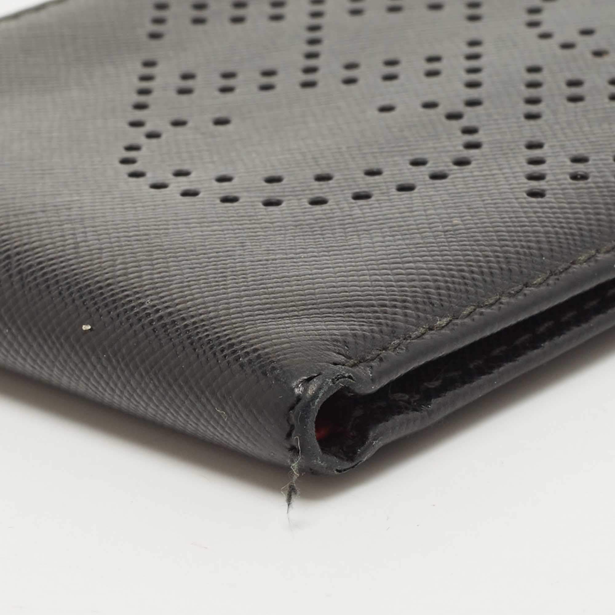 Pre Owned CH Carolina Herrera Black Leather Perforated Logo Bifold Wallet