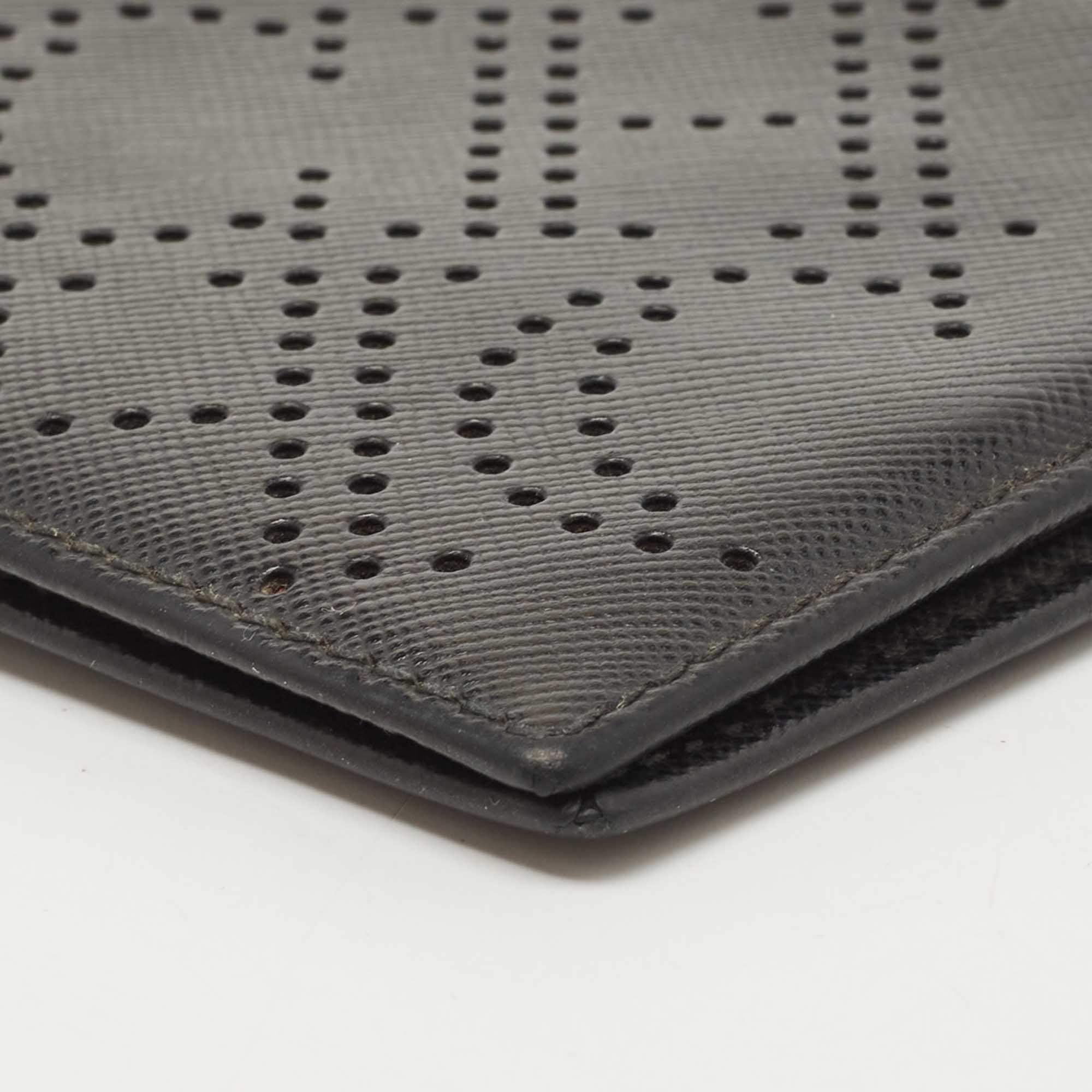 Pre Owned CH Carolina Herrera Black Leather Perforated Logo Bifold Wallet