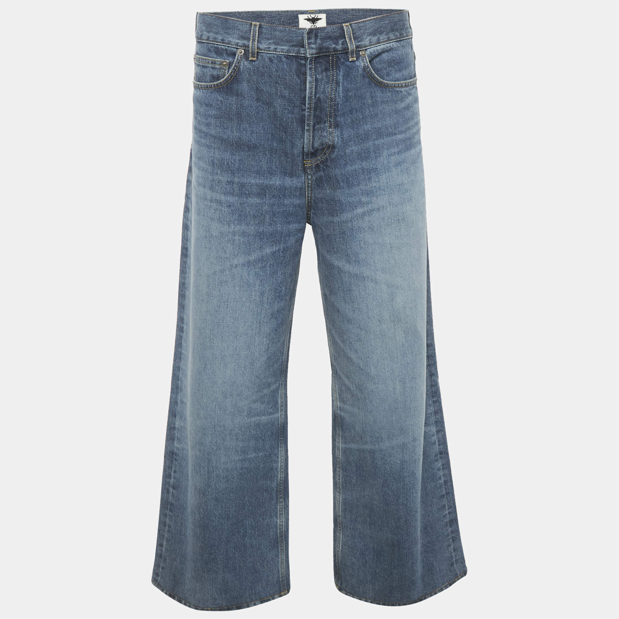 مملوكة مسبقًا بنطلون جينز كريستيان ديور دنيم أزرق واسع بوسط 33 إنش