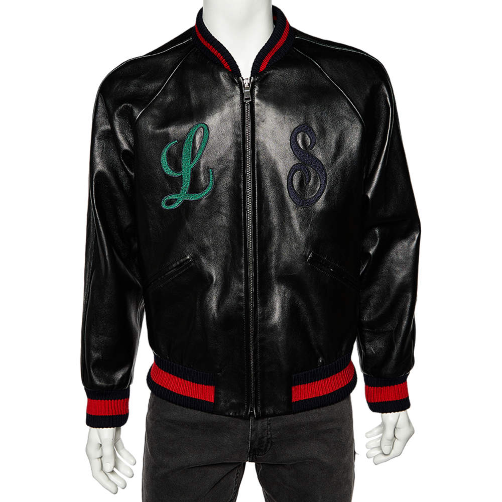 Pre Owned جاكت منفوخ غوتشي أبليك حروف دي أي واي جلد أسود مقاس متوسط