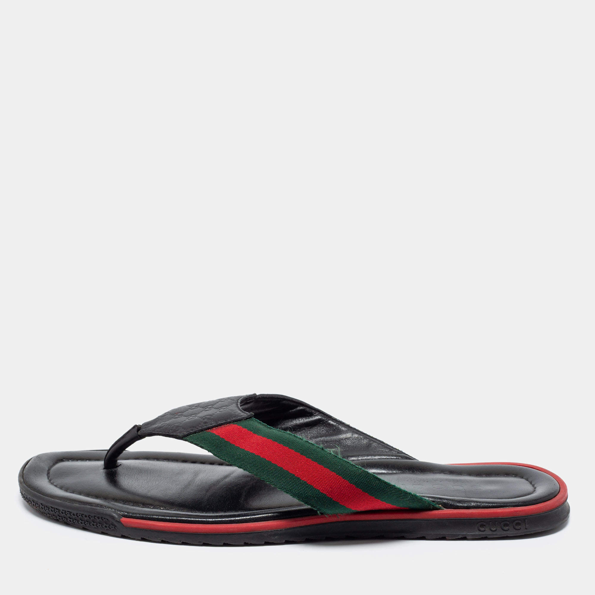 مملوكة مسبقًا صندل غوتشي بإصبع فلات جلد جي جي أسود مزين بشريط ويب مقاس 43.5