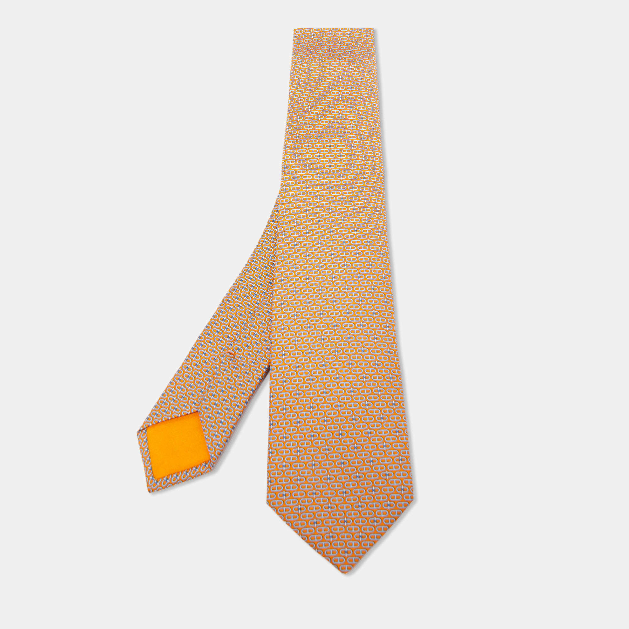 Pre Owned Hermès Orange Glenan Twillbi Printed Silk Slim Tie