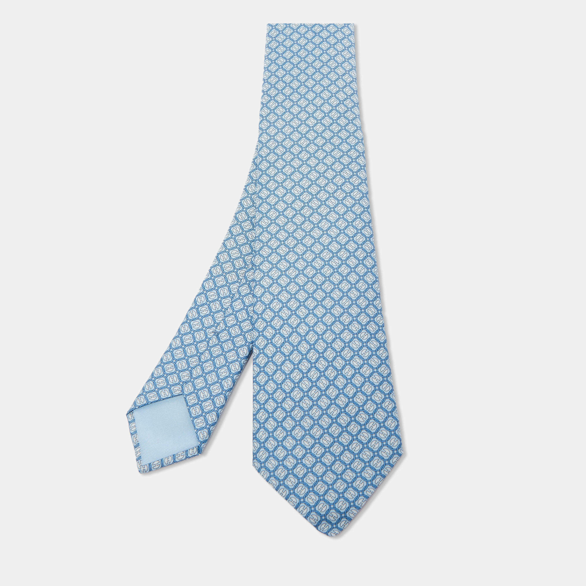 Pre Owned Hermès Blue La Roue Tourne Printed Silk Slim Tie