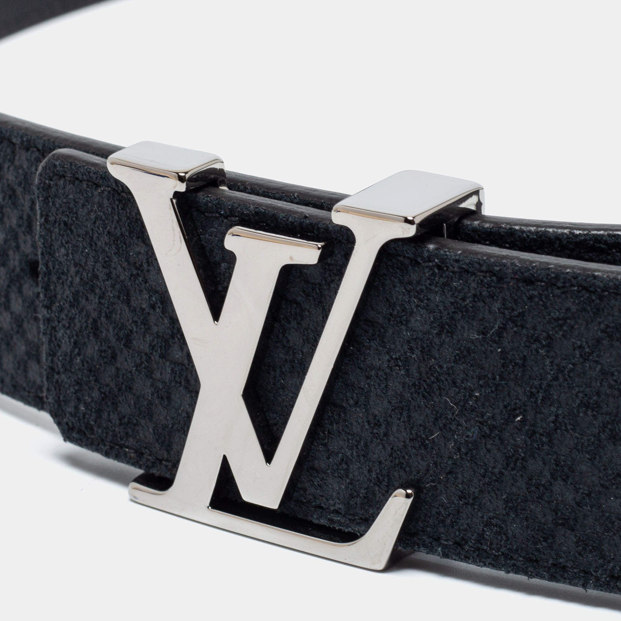 Louis Vuitton, a navy suede 'LV Initiales' belt. size 100, 2012