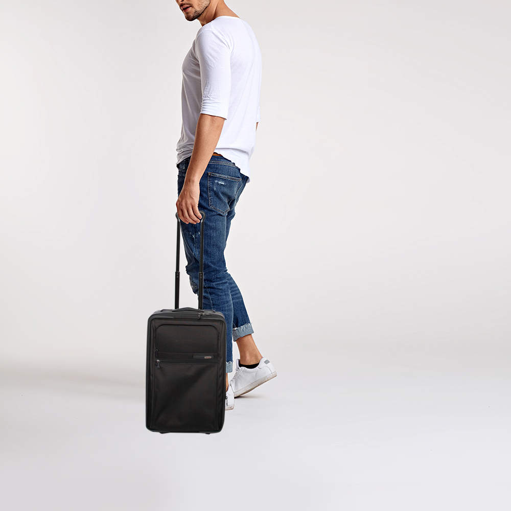 tumi travel bolsas