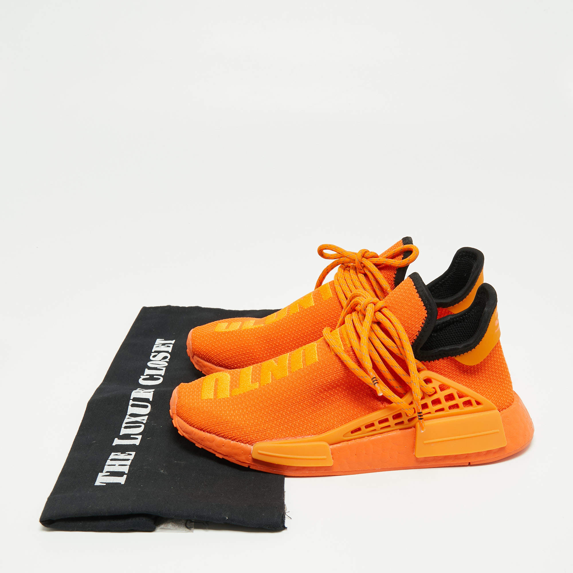 Tigre Viaje Abrazadera Pharrell Williams x adidas Orange Knit Fabric NMD Hu Sneakers Size 38  Pharrell Williams | TLC