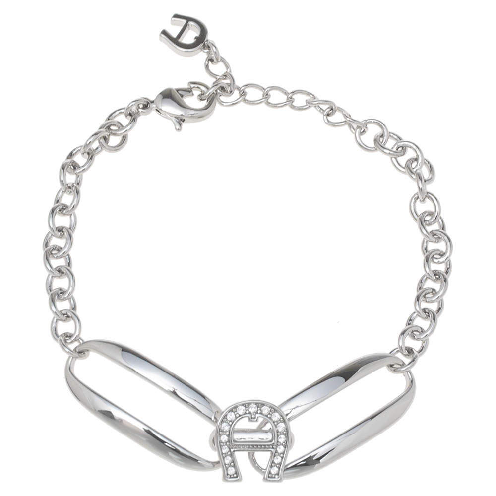 Pre Owned Aigner Silver Tone Crystal Logo Bracelet