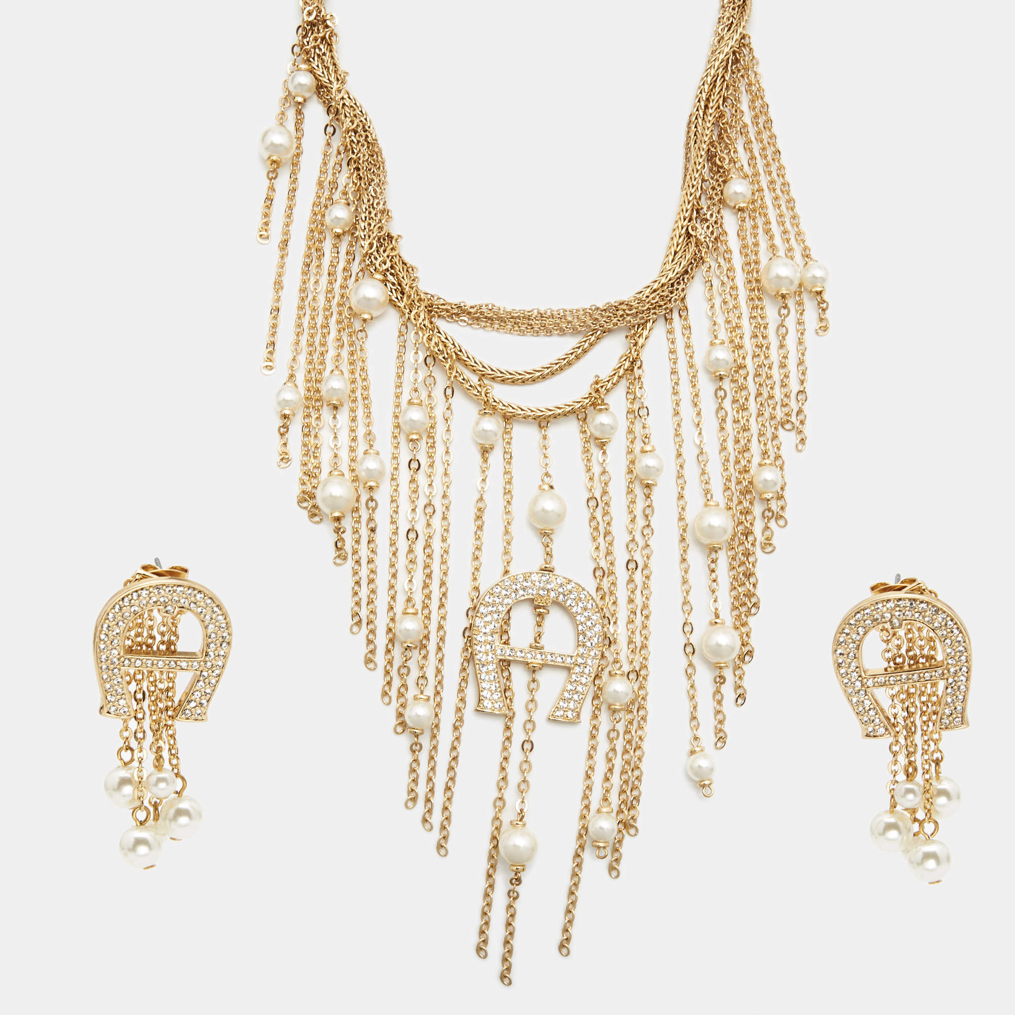 Pre Owned Aigner Gold Tone Capri Necklace and Earring Set