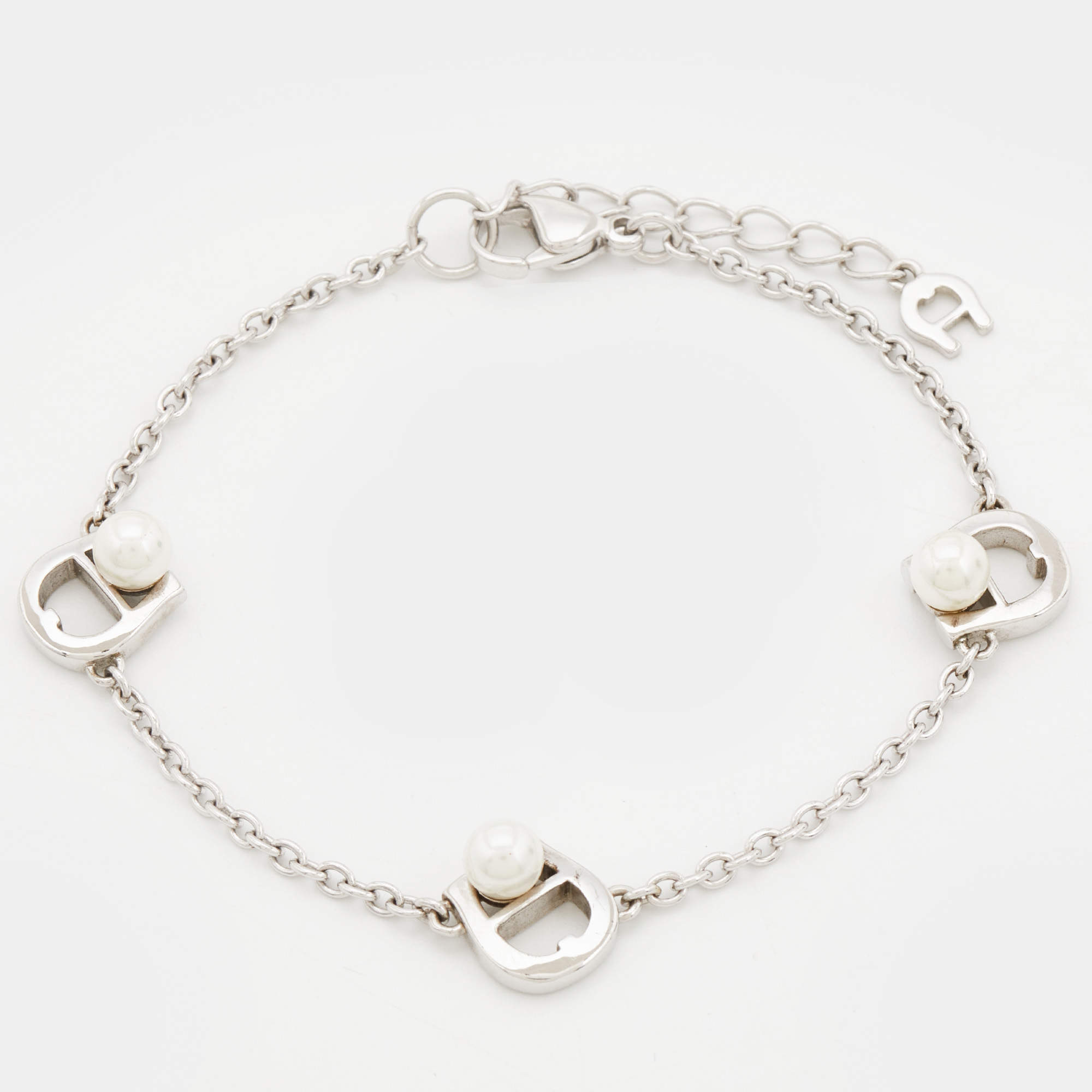 Pre Owned Aigner Faux Pearl Silver Tone Bracelet