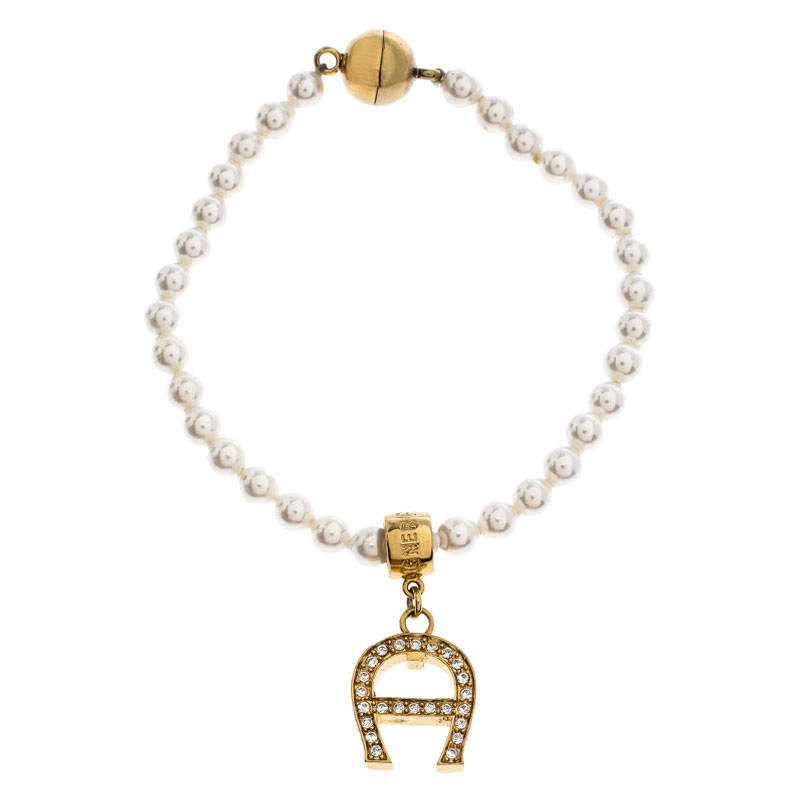 Pre Owned Aigner Faux Pearl Crystal Logo Pendant Magnetic Bracelet