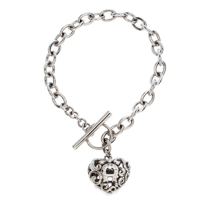 Aigner Silver Plated Crystal Cutwork Heart Charm Toggle Bracelet