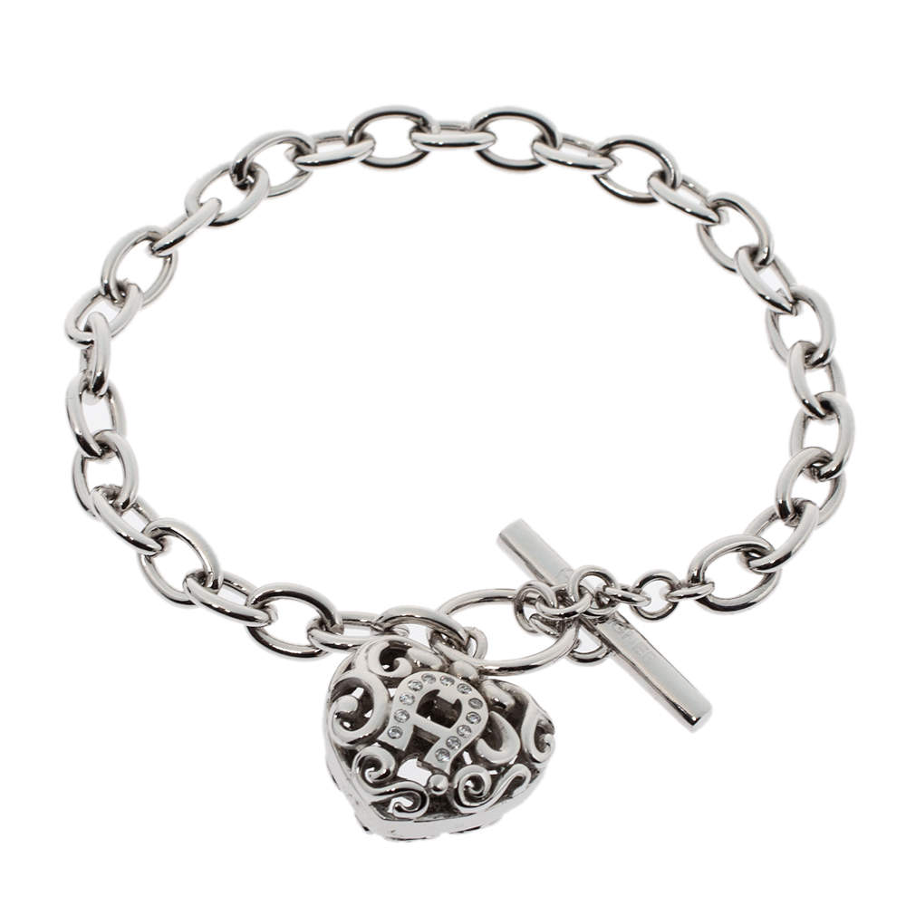 Aigner Silver Tone Crystal Heart Charm Toggle Bracelet