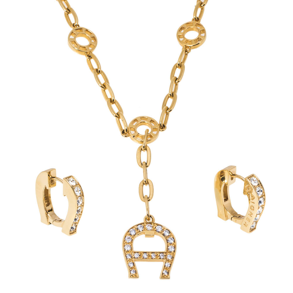 Pre Owned Aigner Logo Crystal Gold Tone Earring Necklace Set