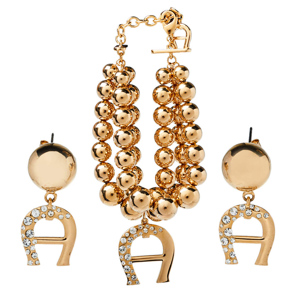 Aigner Gold Tone Layered Bracelet and Logo Drop Earrings Set