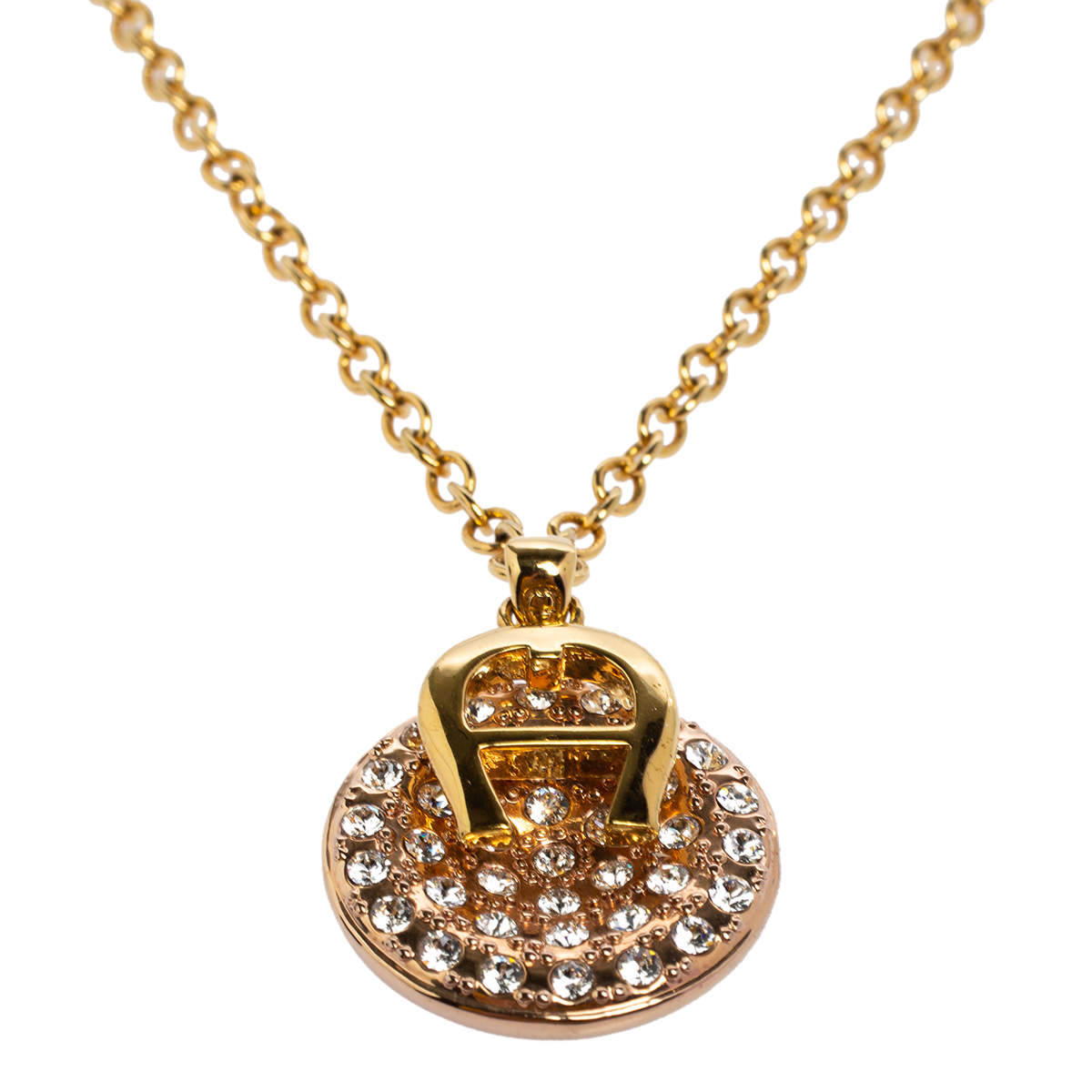 Pre Owned Aigner Logo Crystal Two Tone Metal Pendant Necklace