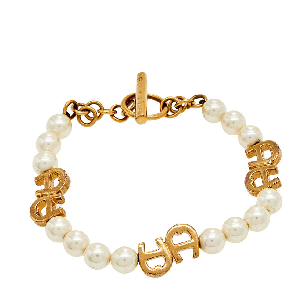 Pre Owned Aigner Gold Tone Faux Pearl Toggle Bracelet