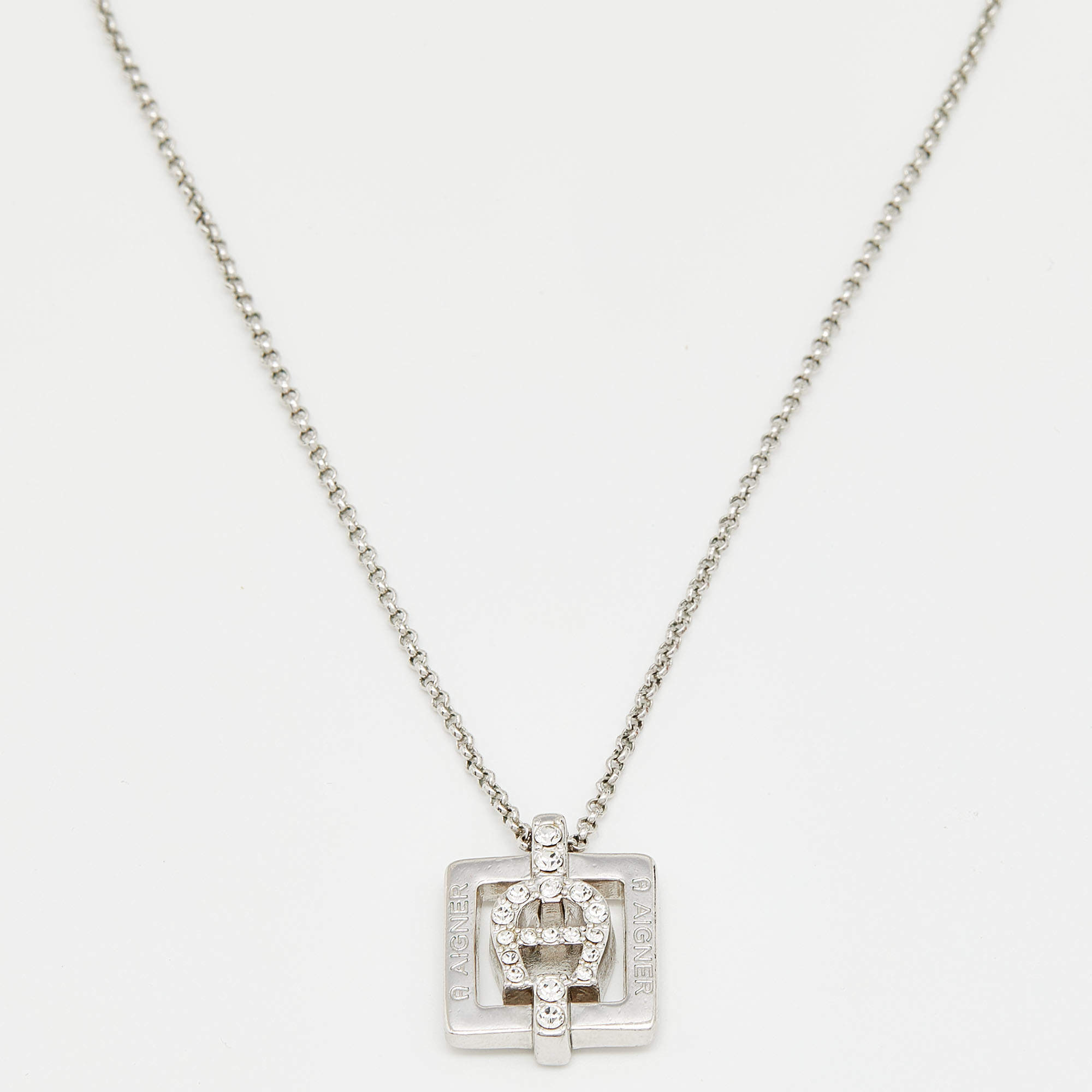 Pre Owned Aigner Crystal Studded Silver Tone Square Pendant Necklace