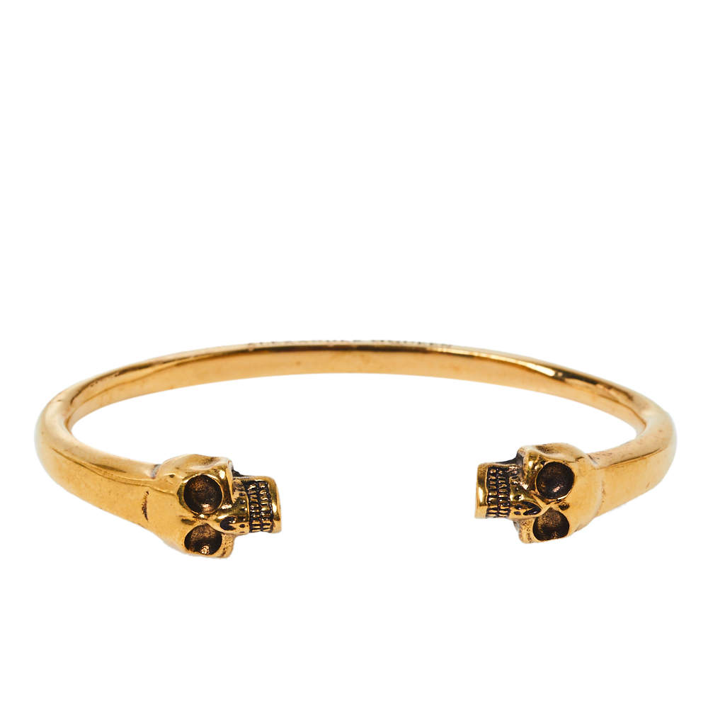 Pre Owned Alexander McQueen Twin Skull Motif Gold Tone Open Cuff Bracelet