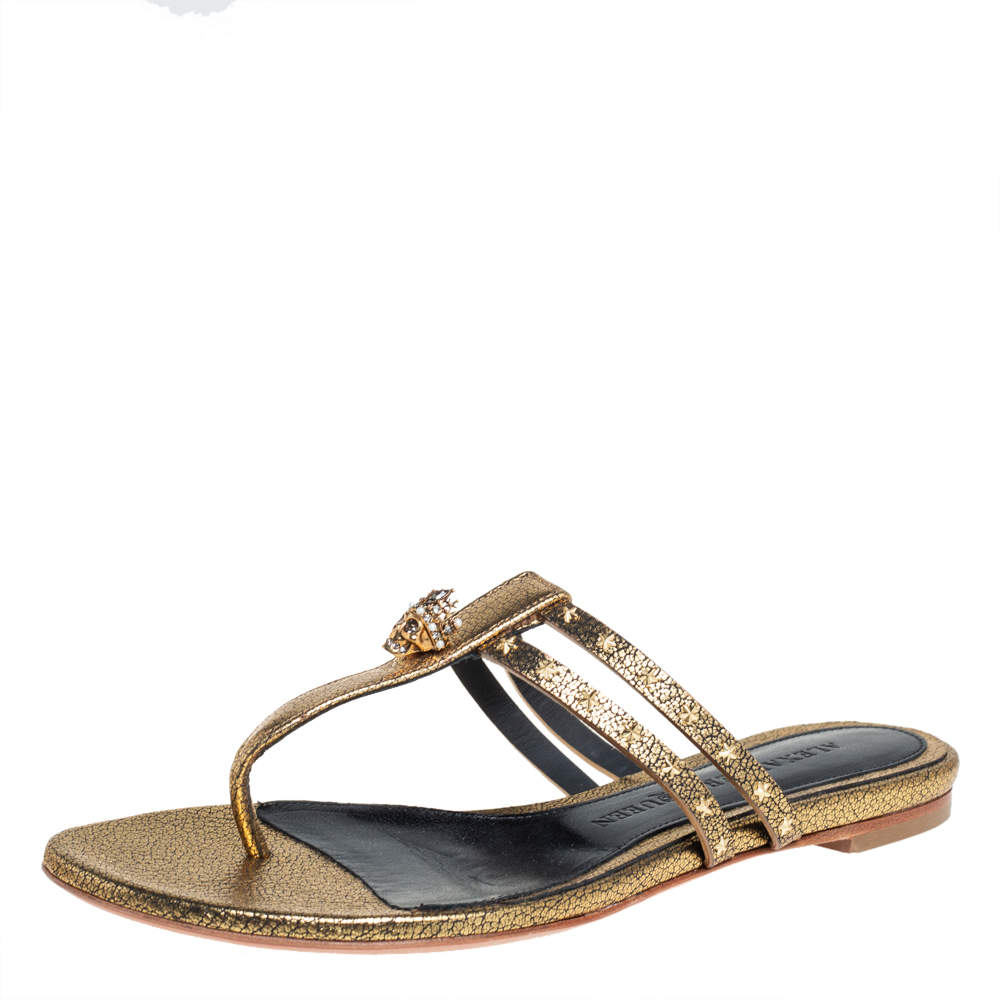 Pre Owned Alexander McQueen Metallic Gold Leather Embellished Skull Thong Flat Sandals Size 37.5
