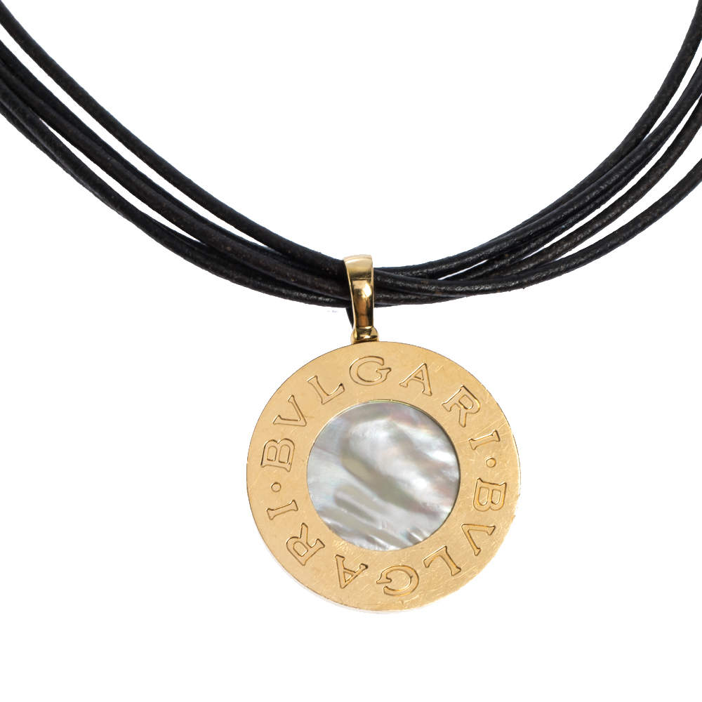 Pre Owned Bvlgari 18K Yellow Gold Steel MOP Onyx Pendant Leather Cord Necklace