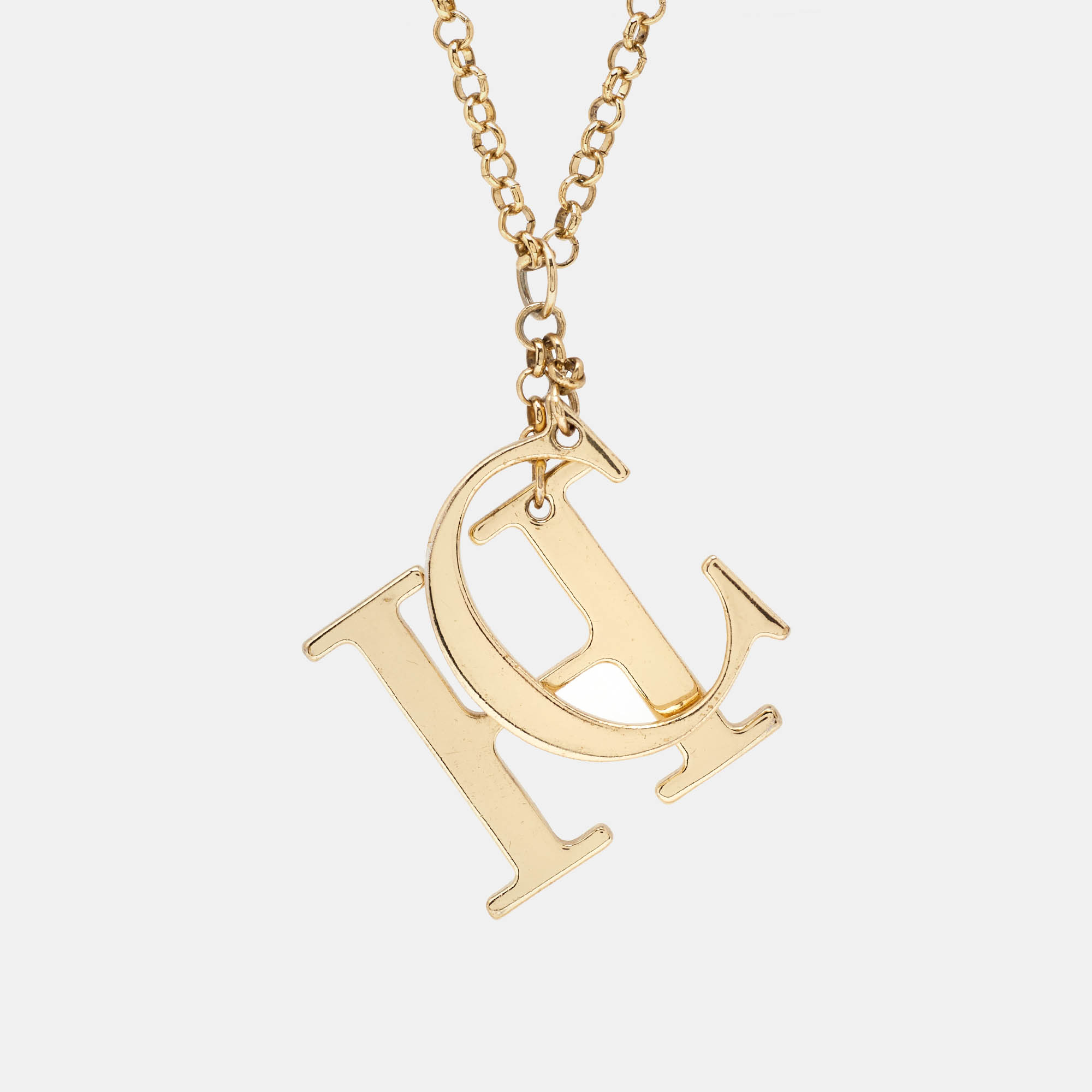 Pre Owned Carolina Herrera CH Logo Charm Gold Tone Long Toggle Pendant Necklace